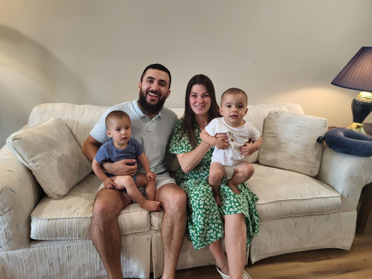Ivan and Anastasia Slepov with their twin sons in Wilmington apartment
